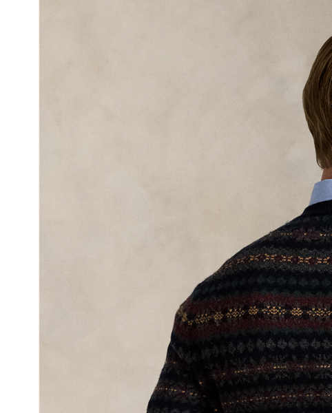 This jumper unites six different hues of wool yarn to create its intricate Fair Isle pattern. It is finished with our signature embroidered Pony on the left chest.