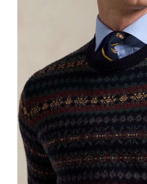 This jumper unites six different hues of wool yarn to create its intricate Fair Isle pattern. It is finished with our signature embroidered Pony on the left chest.