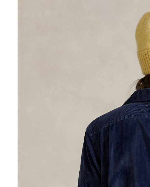 This layer's wide-wale corduroy ensures warmth during brisk days while maintaining the laid-back look of a traditional camp shirt design.