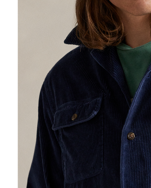 This layer's wide-wale corduroy ensures warmth during brisk days while maintaining the laid-back look of a traditional camp shirt design.