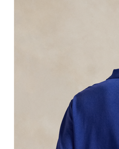 An American style standard since 1972, the Polo shirt has been imitated but never matched. Over the decades,  Ralph Lauren Lauren has reimagined his signature style in a wide array of colours and fits, yet all retain the quality and attention to detail of the iconic original. This cotton mesh version features our founder's first name rendered in a felt patch with chain-stitched embroidery.