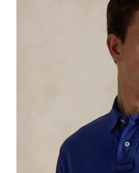 An American style standard since 1972, the Polo shirt has been imitated but never matched. Over the decades,  Ralph Lauren Lauren has reimagined his signature style in a wide array of colours and fits, yet all retain the quality and attention to detail of the iconic original. This cotton mesh version features our founder's first name rendered in a felt patch with chain-stitched embroidery.