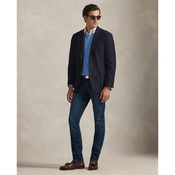 The slim-leg Sullivan features a regular rise and a trim fit through the seat, thigh and knee. This pair is crafted from indigo-dyed denim woven with a hint of stretch for enhanced comfort. At the back, it is intricately embroidered with the iconic Polo Pony.