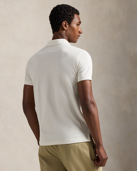 An American style standard since 1972, the Polo shirt has been imitated but never matched. Over the decades, Ralph Lauren Lauren has re-imagined his signature style in a wide array of colours and fits, yet all retain the quality and attention to detail of the iconic original. This version is made with our highly breathable cotton mesh and embroidered with our beloved Polo Bear.