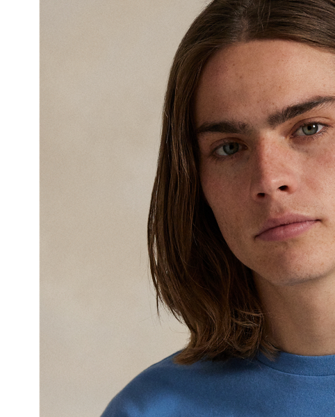 This cotton T-shirt features our logo intricately embroidered at the front and our iconic mascot, the Polo Bear, printed at the back.