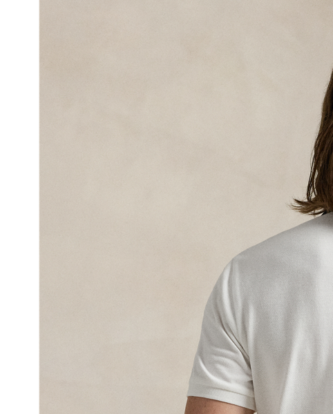 An American style standard since 1972, the Polo shirt has been imitated but never matched. Over the decades,  Ralph Lauren Lauren has reimagined his signature style in a wide array of colours and fits, yet all retain the quality and attention to detail of the iconic original. This mesh version features an equestrian-inspired crest celebrating 20 years of  Ralph Lauren Lauren's iconic Big Pony.