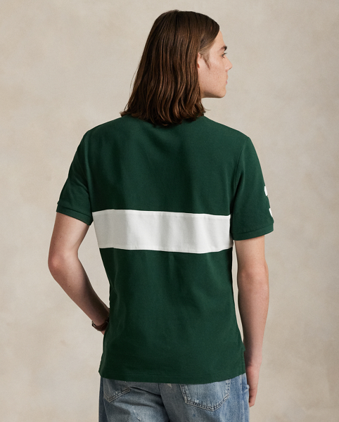 An American style standard since 1972, the Polo shirt has been imitated but never matched. Over the decades, Ralph Lauren Lauren has reimagined his signature style in a wide array of colours and fits, yet all retain the quality and attention to detail of the iconic original. This mesh version features an equestrian-inspired crest that celebrates 20 years of Ralph Lauren Lauren's iconic Big Pony.