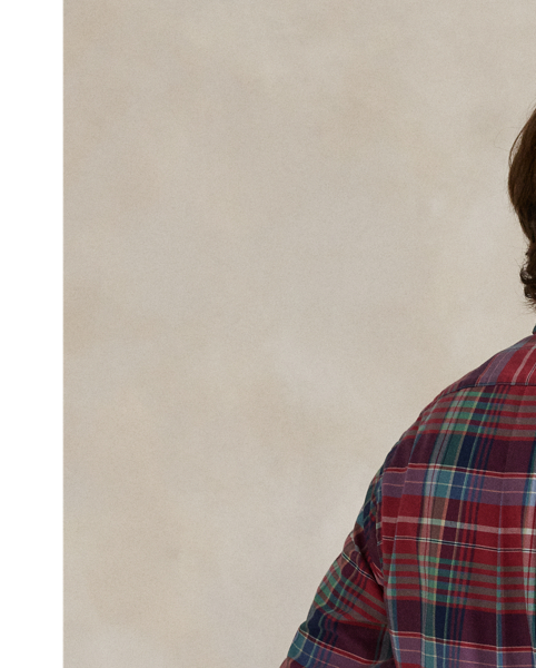 The oxford shirt made its debut very early in  Ralph Lauren Lauren’s designs, and since then, it has solidified its status as a pillar of the Polo look. Our fabric is developed with a secret wash, giving it instant character, ease and a heathered softness – what we refer to as "the perfect rumple". The formula is so unique that it's been kept in a safe for more than three decades. Today, Mr Lauren continues to create countless variations of his iconic shirt, including this plaid version, which is finished with our signature embroidered Pony.