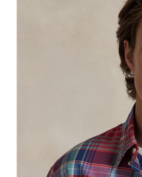 The oxford shirt made its debut very early in  Ralph Lauren Lauren’s designs, and since then, it has solidified its status as a pillar of the Polo look. Our fabric is developed with a secret wash, giving it instant character, ease and a heathered softness – what we refer to as "the perfect rumple". The formula is so unique that it's been kept in a safe for more than three decades. Today, Mr Lauren continues to create countless variations of his iconic shirt, including this plaid version, which is finished with our signature embroidered Pony.