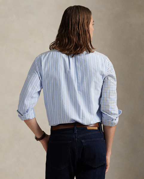 Decades ago, tailors would learn their craft by sewing together shirts made from fabric remnants. Over time, a staple of playful preppy style evolved from this practice – the fun shirt. This version combines contrasting stripes and tattersall into a single statement-making oxford, adorned with the iconic multicoloured Pony.