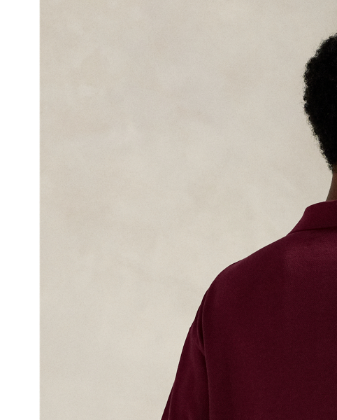 An American style standard since 1972, the Polo shirt has been imitated but never matched. Over the decades,  Ralph Lauren Lauren has reimagined his signature style in a wide array of colours and fits, yet all retain the quality and attention to detail of the iconic original. This unisex version unites two signature details from the '90s – our iconic Big Fit and our Polo Sport logo – for throwback style.