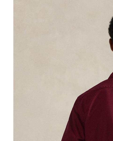 The Oxford shirt made its debut very early in  Ralph Lauren Lauren’s designs, and since then, it has solidified its status as a pillar of the Polo look. Our fabric is developed with a secret wash, giving it instant character, ease and a heathered softness – what we refer to as "the perfect rumple". The formula is so unique that it's been kept in a safe for more than three decades. Today, Mr Lauren continues to create countless variations of his iconic shirt, including this unisex version that is garment-dyed and embroidered with our iconic Polo Sport logo.