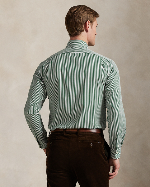 Meticulously crafted with lightweight cotton poplin, this striped shirt delivers impeccable Polo style with its crisp texture and precise tailoring. The classic design is further elevated by our iconic embroidered Pony, which adds a distinctive signature touch.