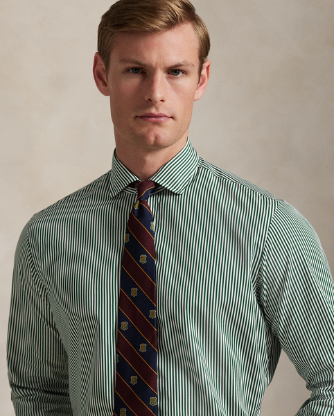 Meticulously crafted with lightweight cotton poplin, this striped shirt delivers impeccable Polo style with its crisp texture and precise tailoring. The classic design is further elevated by our iconic embroidered Pony, which adds a distinctive signature touch.