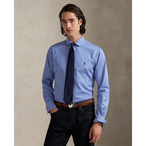 Meticulously crafted with lightweight cotton poplin, this striped shirt delivers impeccable Polo style with its crisp texture and precise tailoring. The classic design is further elevated by our iconic embroidered Pony, which adds a distinctive signature touch.