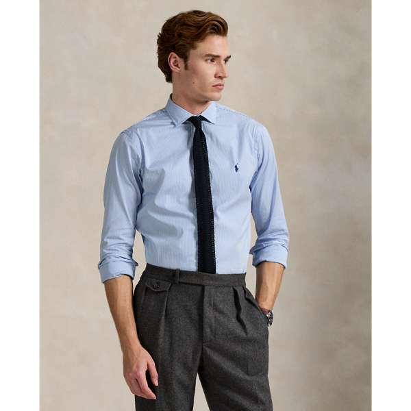 Meticulously crafted with lightweight cotton poplin, this striped shirt delivers impeccable Polo style with its crisp texture and precise tailoring. The classic design is further elevated by our iconic embroidered Pony, which adds a distinctive signature touch.