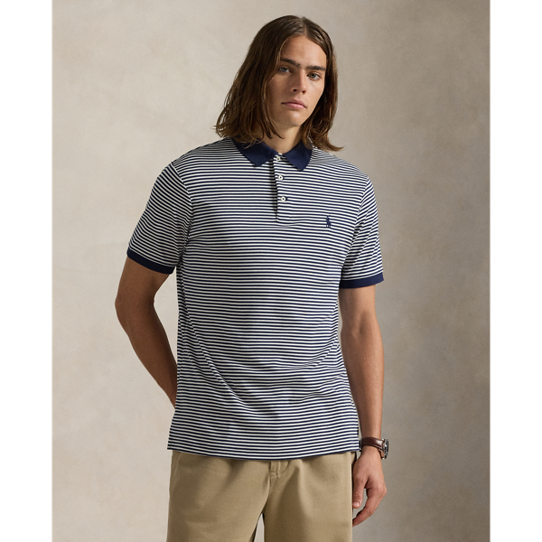 An American style standard since 1972, the Polo shirt has been imitated but never matched. Over the decades, Ralph Lauren Lauren has re-imagined his signature style in a wide array of colours and fits, yet all retain the quality and attention to detail of the iconic original. This striped version is made with luxe cotton interlock featuring an ultrasoft finish.