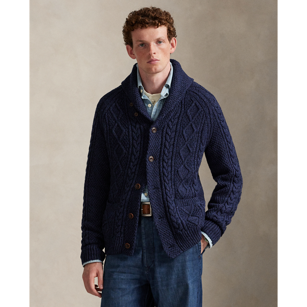 This cardigan is crafted from thick-gauge cotton yarn and features a textured Aran-knit construction.
