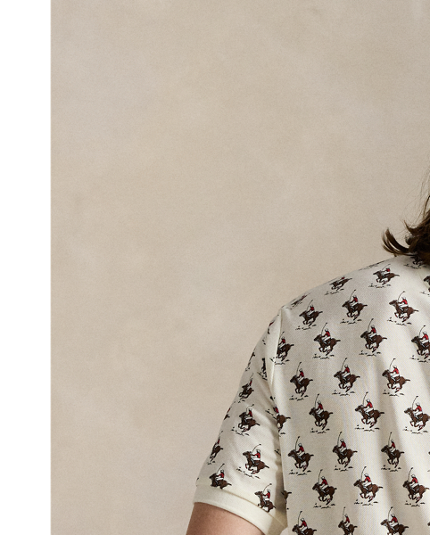 An American style standard since 1972, the Polo shirt has been imitated but never matched. Over the decades,  Ralph Lauren Lauren has re-imagined his signature style in a wide array of colours and fits, yet all retain the quality and attention to detail of the iconic original. This version is made with our highly breathable cotton mesh and printed with a polo player motif.