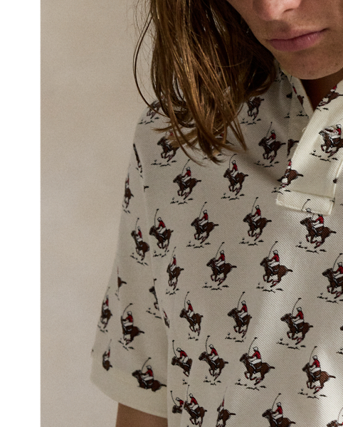 An American style standard since 1972, the Polo shirt has been imitated but never matched. Over the decades,  Ralph Lauren Lauren has re-imagined his signature style in a wide array of colours and fits, yet all retain the quality and attention to detail of the iconic original. This version is made with our highly breathable cotton mesh and printed with a polo player motif.