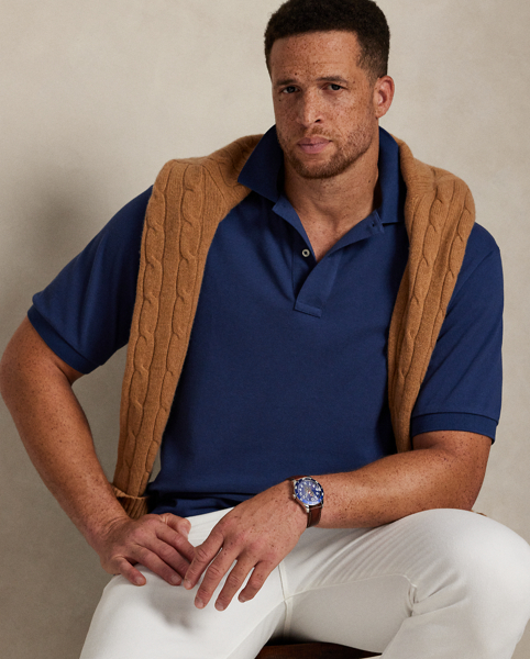 An American style standard since 1972, the Polo shirt has been imitated but never matched. Over the decades, Ralph Lauren Lauren has reimagined his signature style in a wide array of colours and fits, yet all retain the quality and attention to detail of the iconic original. This Big & Tall version is made with our highly breathable cotton mesh, which offers a textured look and a soft feel.
