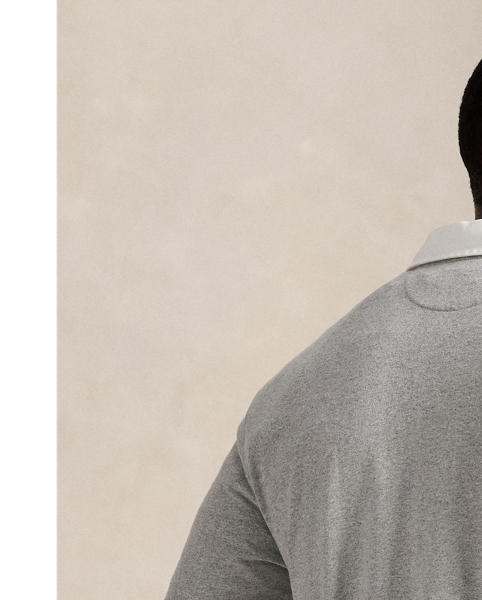 With its athletic details and timeless design, The Iconic Rugby Shirt captures the preppy yet sporty sensibility that has long defined the Polo  Ralph Lauren Lauren brand. This version features all the hallmarks of a traditional rugby shirt&mdash;the white point collar, a concealed placket, rubber buttons, and ribbed cuffs. Made from durable cotton jersey that stays true to the sport's rough-and-tumble heritage, this shirt will stand up to repeated wear on and off the field of play.