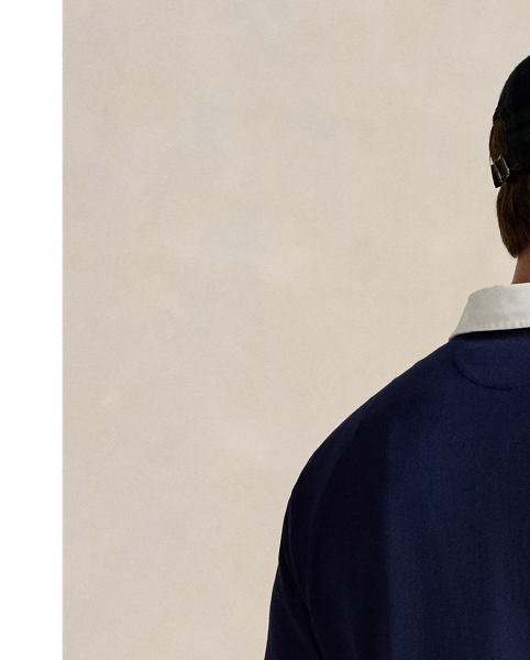 With its athletic details and timeless design, The Iconic Rugby Shirt captures the preppy yet sporty sensibility that has long defined the Polo  Ralph Lauren Lauren brand. This version features all the hallmarks of a traditional rugby shirt&mdash;the white point collar, a concealed placket, rubber buttons, and ribbed cuffs. Made from durable cotton jersey that stays true to the sport's rough-and-tumble heritage, this shirt will stand up to repeated wear on and off the field of play.