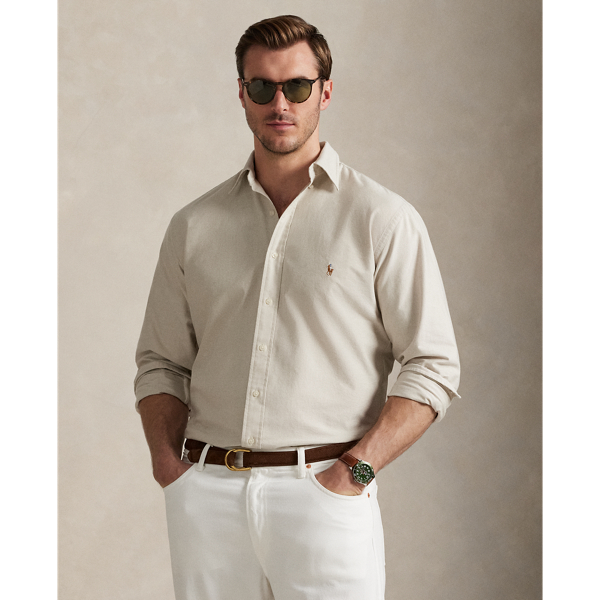 The oxford shirt made its debut very early in Ralph Lauren Lauren’s designs, and since then, it has solidified its status as a pillar of the Polo look. Our fabric is developed with a secret wash, which gives it instant character, ease and a heathered softness – what we refer to as "the perfect rumple". The formula is so unique that it's been kept in a safe for more than three decades. Today, Mr Lauren continues to create countless variations of his iconic shirt, including this Big & Tall version, which is embroidered with our multicoloured signature Pony.