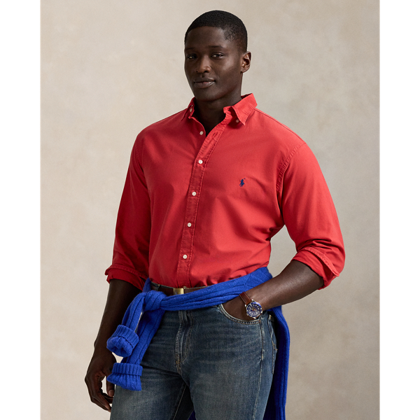 The oxford shirt made its debut very early in  Ralph Lauren Lauren’s designs, and since then, it has solidified its status as a pillar of the Polo look. Our fabric is developed with a secret wash, giving it instant character, ease and a heathered softness – what we refer to as "the perfect rumple". The formula is so unique that it's been kept in a safe for more than three decades. Today, Mr Lauren continues to create countless variations of his iconic shirt, including this Big & Tall version, which is garment-dyed and treated for a broken-in look and feel from day one.