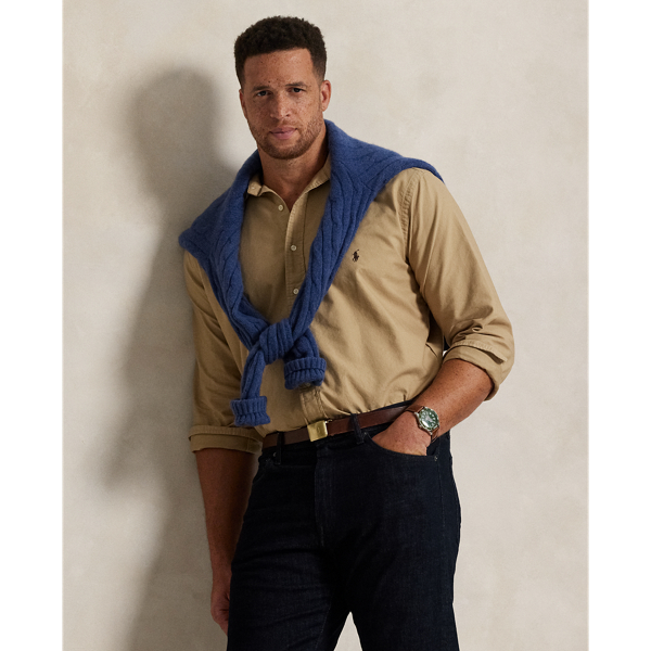 The oxford shirt made its debut very early in  Ralph Lauren Lauren’s designs, and since then, it has solidified its status as a pillar of the Polo look. Our fabric is developed with a secret wash, giving it instant character, ease and a heathered softness – what we refer to as "the perfect rumple". The formula is so unique that it's been kept in a safe for more than three decades. Today, Mr Lauren continues to create countless variations of his iconic shirt, including this Big & Tall version, which is garment-dyed and treated for a broken-in look and feel from day one.