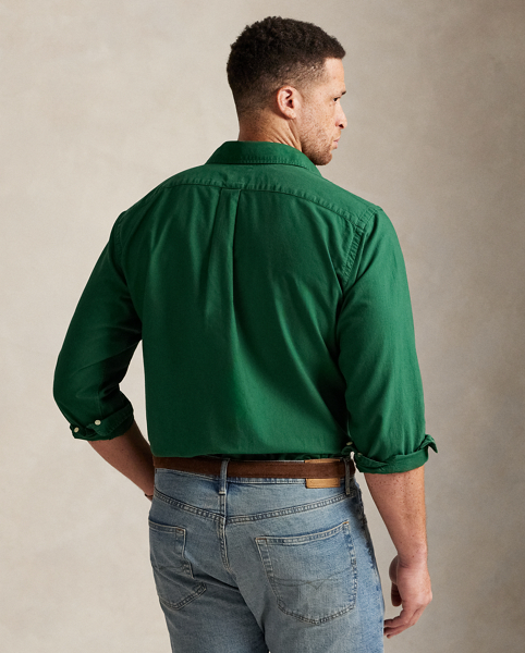 The oxford shirt made its debut very early in Ralph Lauren Lauren’s designs, and since then, it has solidified its status as a pillar of the Polo look. Our fabric is developed with a secret wash, giving it instant character, ease and a heathered softness – what we refer to as "the perfect rumple". The formula is so unique that it's been kept in a safe for more than three decades. Today, Mr Lauren continues to create countless variations of his iconic shirt, including this Big & Tall version, which is garment-dyed and treated for a broken-in look and feel from day one.