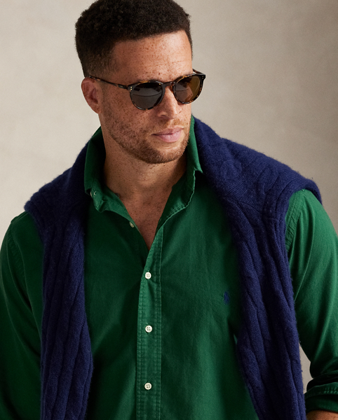 The oxford shirt made its debut very early in Ralph Lauren Lauren’s designs, and since then, it has solidified its status as a pillar of the Polo look. Our fabric is developed with a secret wash, giving it instant character, ease and a heathered softness – what we refer to as "the perfect rumple". The formula is so unique that it's been kept in a safe for more than three decades. Today, Mr Lauren continues to create countless variations of his iconic shirt, including this Big & Tall version, which is garment-dyed and treated for a broken-in look and feel from day one.