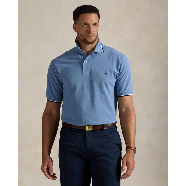 An American style standard since 1972, the Polo shirt has been imitated but never matched. Over the decades, Ralph Lauren Lauren has reimagined his signature style in a wide array of colours and fits, yet all retain the quality and attention to detail of the iconic original. This Big & Tall version is made from our highly breathable cotton mesh, which offers a textured look and a soft feel.