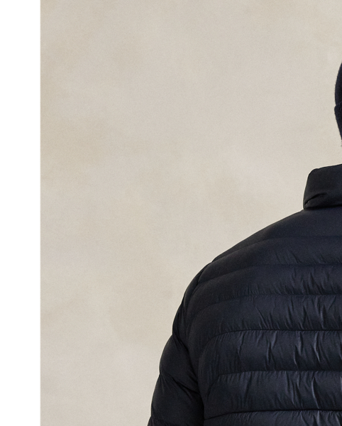 Made from water-repellent fabric, this Big & Tall jacket packs into its own pocket and is developed with an insulating down-alternative fill.