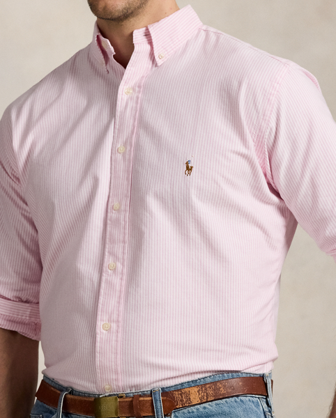 The oxford shirt made its debut very early in Ralph Lauren Lauren’s designs, and since then, it has solidified its status as a pillar of the Polo look. Our fabric is developed with a secret wash, which gives it instant character, ease and a heathered softness. The formula is so unique that it's been kept in a safe for more than three decades. In addition to details evoking its prep-school inspiration, it offers a relaxed feel, producing what we refer to as "the perfect rumple". Today, Mr Lauren continues to create countless variations of his iconic shirt, including this Big & Tall version, which is embroidered with our multicoloured signature Pony.