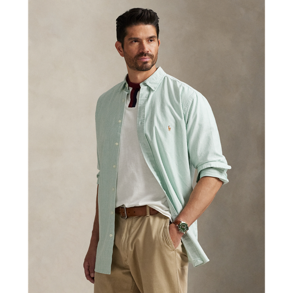 The oxford shirt made its debut very early in Ralph Lauren Lauren’s designs, and since then, it has solidified its status as a pillar of the Polo look. Our fabric is developed with a secret wash, which gives it instant character, ease and a heathered softness. The formula is so unique that it's been kept in a safe for more than three decades. In addition to details evoking its prep-school inspiration, it offers a relaxed feel, producing what we refer to as "the perfect rumple". Today, Mr Lauren continues to create countless variations of his iconic shirt, including this Big & Tall version, which is embroidered with our multicoloured signature Pony.