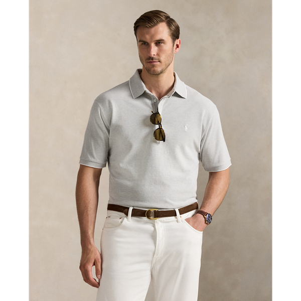 An American style standard since 1972, the Polo shirt has been imitated but never matched. Over the decades, Ralph Lauren Lauren has reimagined his signature style in a wide array of colours and fits, yet all retain the quality and attention to detail of the iconic original. This Big & Tall version includes a hint of stretch and is finished with genuine mother-of-pearl buttons.