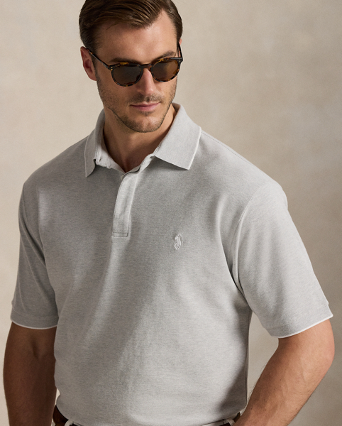 An American style standard since 1972, the Polo shirt has been imitated but never matched. Over the decades, Ralph Lauren Lauren has reimagined his signature style in a wide array of colours and fits, yet all retain the quality and attention to detail of the iconic original. This Big & Tall version includes a hint of stretch and is finished with genuine mother-of-pearl buttons.
