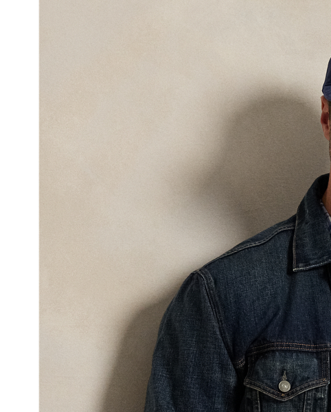 The oxford shirt made its debut very early in  Ralph Lauren Lauren’s designs, and since then, it has solidified its status as a pillar of the Polo look. Our fabric is developed with a secret wash, giving it instant character, ease and a heathered softness – what we refer to as "the perfect rumple". The formula is so unique that it's been kept in a safe for more than three decades. Today, Mr Lauren continues to create countless variations of his iconic shirt, including this plaid Big & Tall version, which is embroidered with our multicoloured signature Pony.