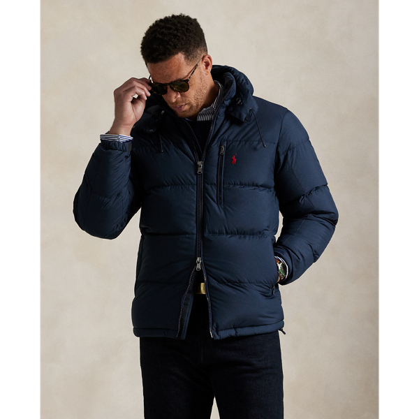 Made from water-repellent ripstop fabric, this Big & Tall jacket is insulated with 650-fill-power down and constructed with a detachable hood.