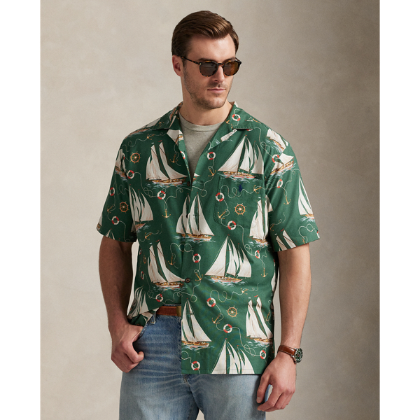 The oxford shirt made its debut very early in  Ralph Lauren Lauren’s designs, and since then, it has solidified its status as a pillar of the Polo look. Our fabric is developed with a secret wash, which gives it instant character, ease and a heathered softness – what we refer to as "the perfect rumple". The formula is so unique that it's been kept in a safe for more than three decades. Today, Mr Lauren continues to create countless variations of his iconic shirt, including this Big & Tall version. It features an archival  Ralph Lauren Lauren print from the early aughts: a sailboat motif inspired by mid-20th-century home furnishing patterns.