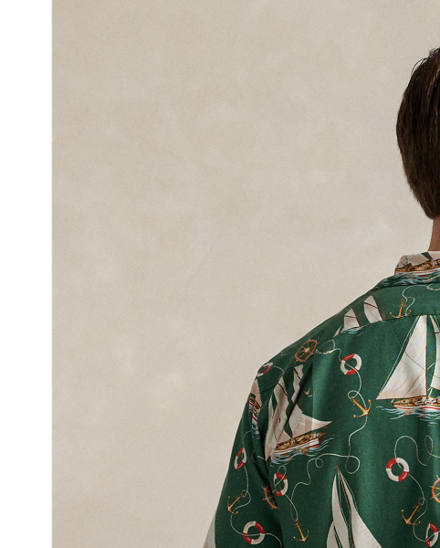 The oxford shirt made its debut very early in  Ralph Lauren Lauren’s designs, and since then, it has solidified its status as a pillar of the Polo look. Our fabric is developed with a secret wash, which gives it instant character, ease and a heathered softness – what we refer to as "the perfect rumple". The formula is so unique that it's been kept in a safe for more than three decades. Today, Mr Lauren continues to create countless variations of his iconic shirt, including this Big & Tall version. It features an archival  Ralph Lauren Lauren print from the early aughts: a sailboat motif inspired by mid-20th-century home furnishing patterns.