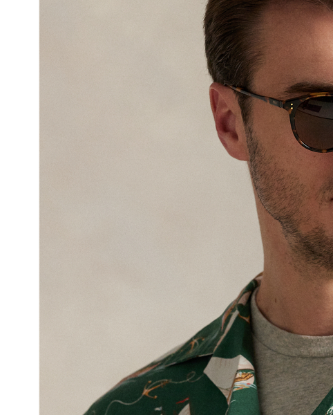 The oxford shirt made its debut very early in  Ralph Lauren Lauren’s designs, and since then, it has solidified its status as a pillar of the Polo look. Our fabric is developed with a secret wash, which gives it instant character, ease and a heathered softness – what we refer to as "the perfect rumple". The formula is so unique that it's been kept in a safe for more than three decades. Today, Mr Lauren continues to create countless variations of his iconic shirt, including this Big & Tall version. It features an archival  Ralph Lauren Lauren print from the early aughts: a sailboat motif inspired by mid-20th-century home furnishing patterns.