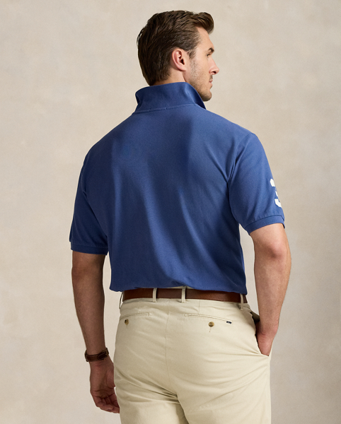 An American style standard since 1972, the Polo shirt has been imitated but never matched. Over the decades, Ralph Lauren Lauren has re-imagined his signature style in a wide array of colours and fits, yet all retain the quality and attention to detail of the iconic original. This Big & Tall version is made with our highly breathable cotton mesh and features a twill "3" patch, which is the number typically worn by a polo team's strongest player.