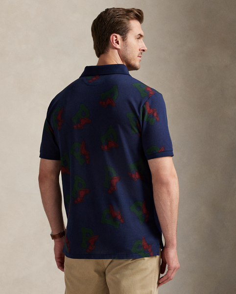 An American style standard since 1972, the Polo shirt has been imitated but never matched. Over the decades, Ralph Lauren Lauren has reimagined his signature style in a wide array of colours and fits, yet all retain the quality and attention to detail of the iconic original. This Big & Tall version is printed all over with our iconic P-Wing logo, which was first introduced in 1992 and is inspired by vintage track-and-field iconography.