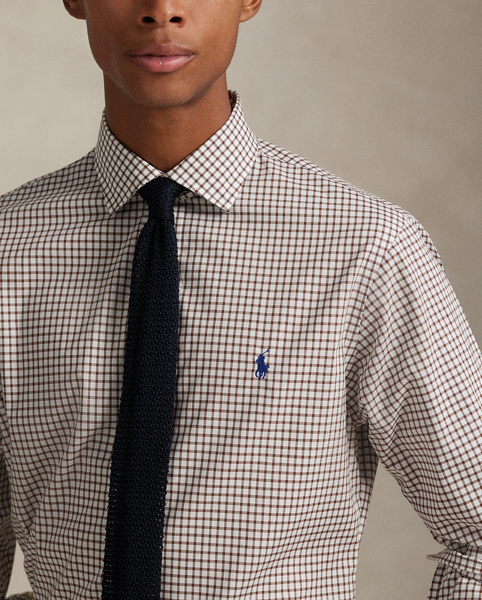 This stretchy shirt is made from cotton PUREPRESS™ technology – a durable press finish, which provides wrinkle resistance while reducing material strength loss and protecting against abrasion.