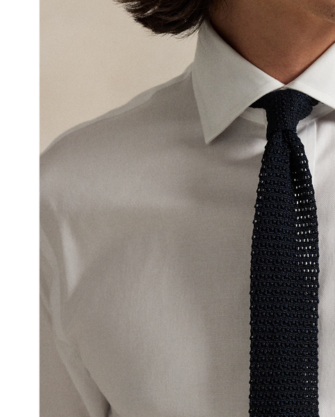 This stretchy shirt is made with cotton PUREPRESS™ technology, a durable press finish that provides wrinkle resistance while reducing material strength loss and protecting against abrasion.