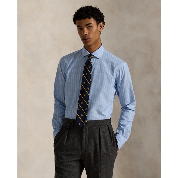 This lightweight shirt combines vintage-inspired stripes, silky cotton cloth and genuine mother-of-pearl buttons for a polished Polo look.