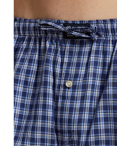 Crafted with lightweight woven cotton, the long-sleeve shirt and trousers in this pyjama set are printed all over with a monogram motif.