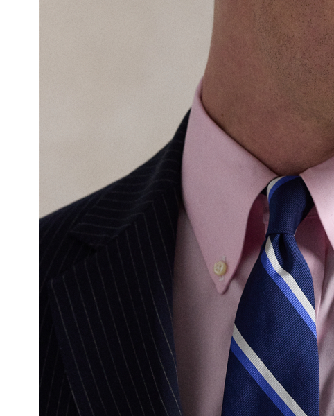 Our Polo suit jacket offers more structure in the chest and shoulders along with full lining. This striped version is crafted with a twill cloth that is custom-developed for natural wrinkle resistance and a smooth, shine-free finish. Added stretch provides extra comfort, making this lightweight layer perfect for all-season, everyday wear.